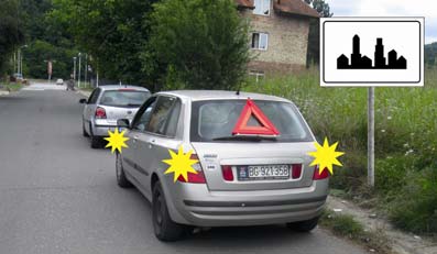 У ситуацији приказаној на слици моторно возило које на путу вуче неисправно моторно возило не сме се кретати брзином већом од: